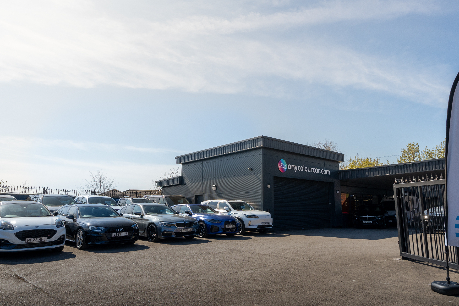 Any Colour Car facility with cars parked outside